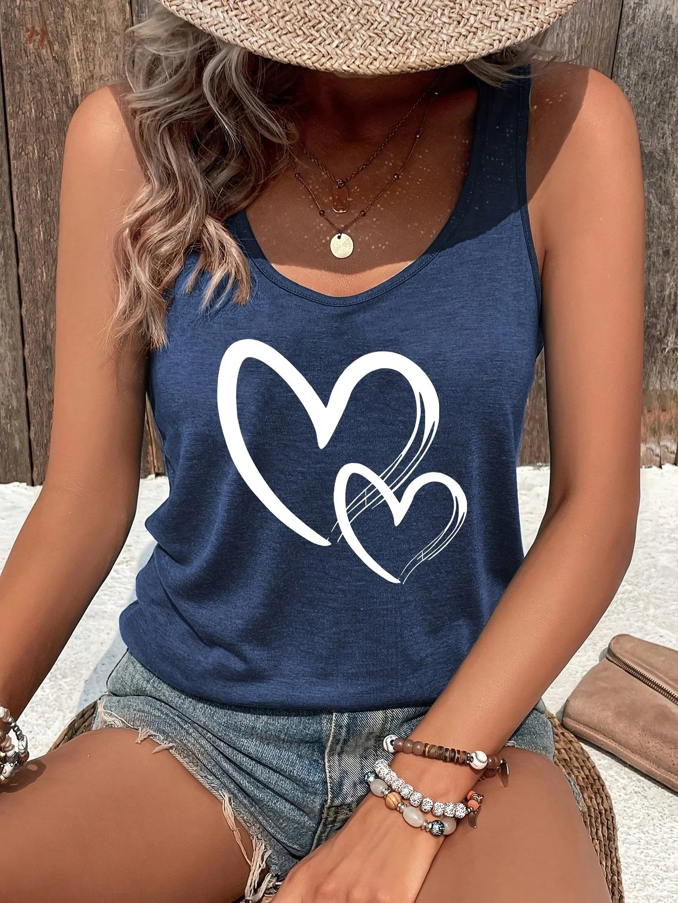 Nouveau gilet décontracté pour femmes pour l'été, une variété de styles imprimés, gilet bleu sans manches de style station, pour femmes