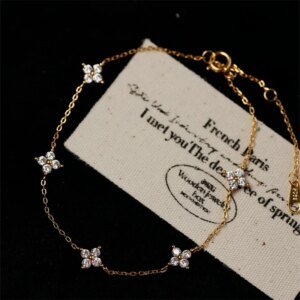 Bracelet en acier inoxydable, fleur en cristal