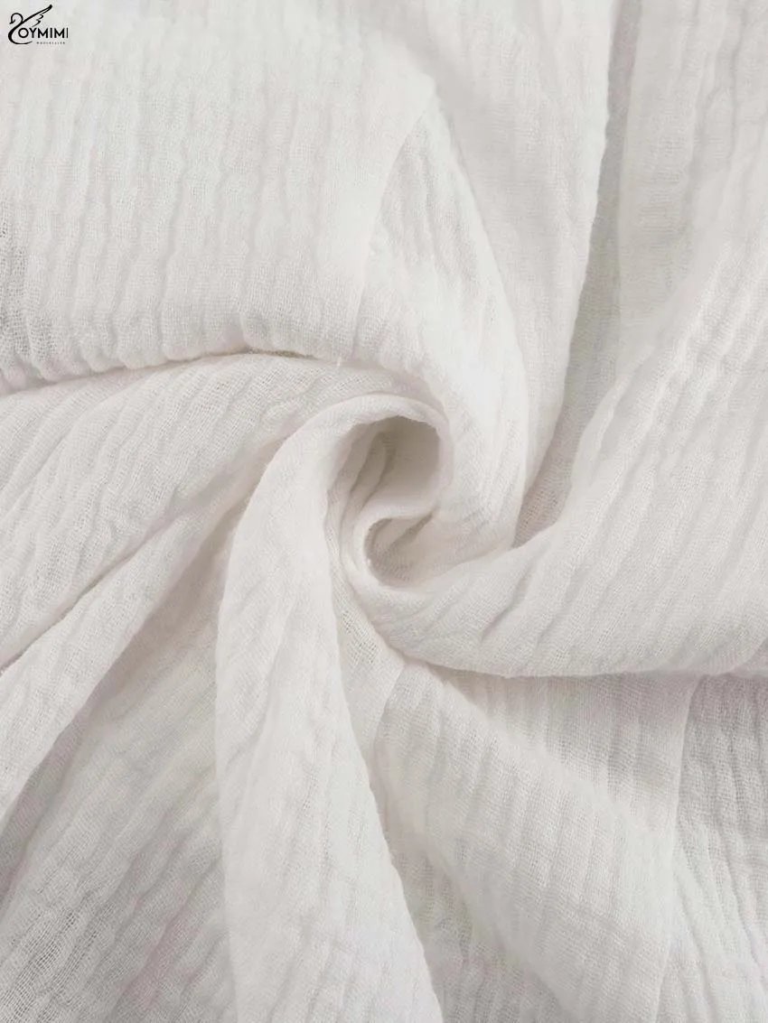 Robe bohème élégante en coton blanc cassé Robe bohème élégante en coton blanc cassé