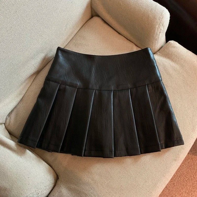 Jupe plissé effet cuir taille haute