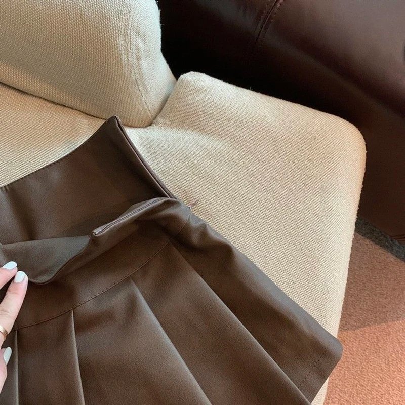 Jupe plissé effet cuir taille haute