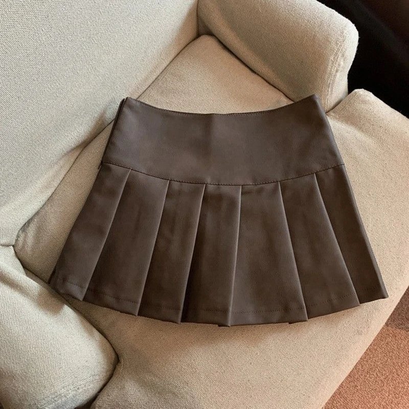Jupe plissé effet cuir taille haute